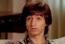 A young adult, Scott Merz with brown hair in a bowl cut.