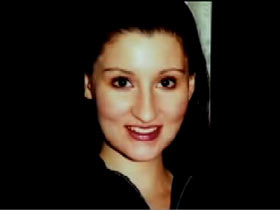 A caucasian woman with long straight brown hair, Claudia Kirschhoch.