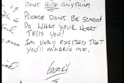 A close up on a note left in a yearbook, it reads 'Please don't be scared, do what your heart tells you! I'm very excited that you'll make it'