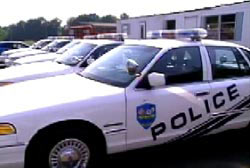 A row of parked police cars.