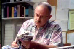 James holding the evidence from the murder