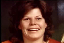 Smiling Jesslyn Rich with light brown medium length hair