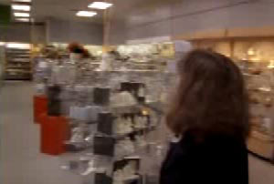 Lisa's coworker walking into an empty store