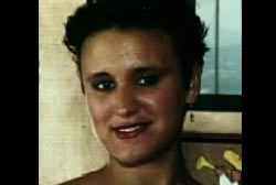 Smiling Megan Curl with short dark hair