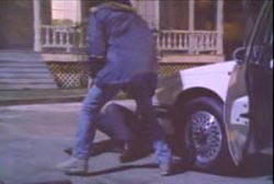 A lone robber accosting Franke outside a house