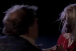 Jim yelling at and holding Susan aggressively