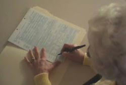 Terri filling out a new life insurance policy for herself