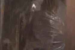 A man trapped inside of a submarine with water leaking in from all sides