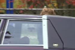Jessica entering a car