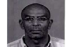 Mug shot of Jesus Mezquia with glasses