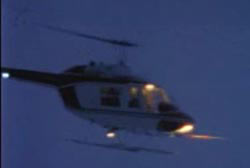 A helicopter in the night sky