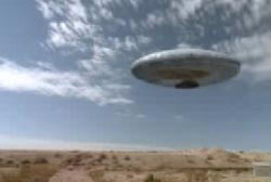 A larg metallic disk shaped craft above the New Mexico desert