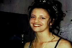 Smiling Natasha Jennings wearing a dress