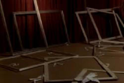 10 empty frames in a museum showroom