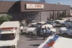 Police and paramedics arriving at the bowling ally where the shooting took place