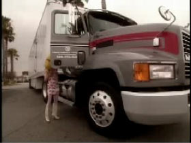 Hazel head opening the passenger door of a semi truck