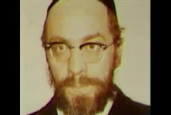 Joseph Prushinowski wearing glasses, kippah, and full beard