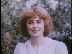 Tanya Kopric smiling with curly red hair