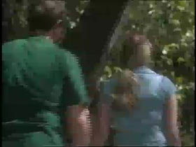 The Backside of a man and younger woman walking towards something